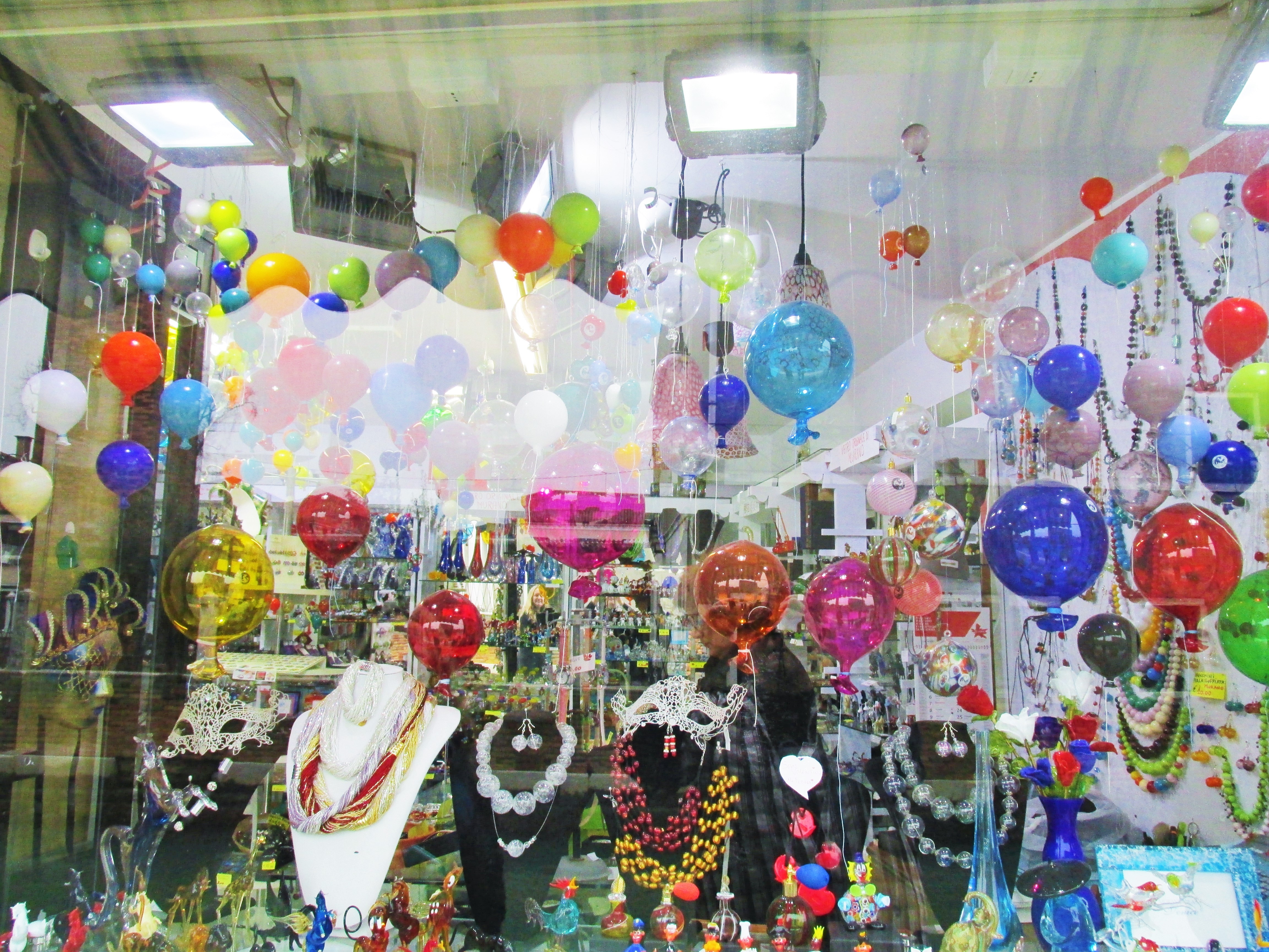 Windows beckon in Murano, but should travelers with children enter glass shops? Photo credit: M. Ciavardini