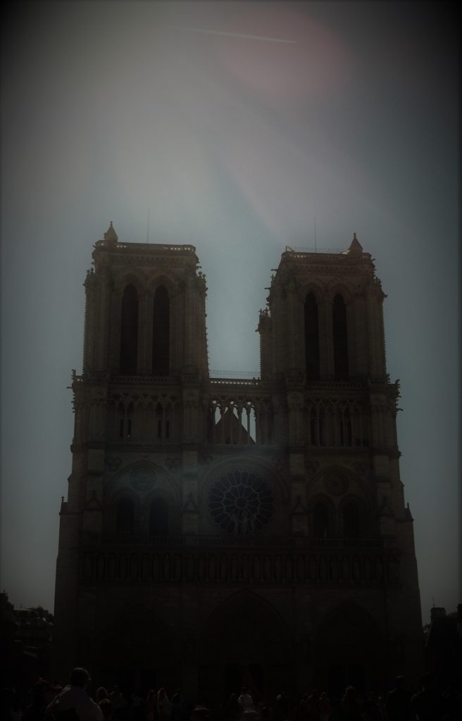 Capture Notre Dame Cathedral--and possibly a spectral presence--in just the right light. Photo credit: V. Laino