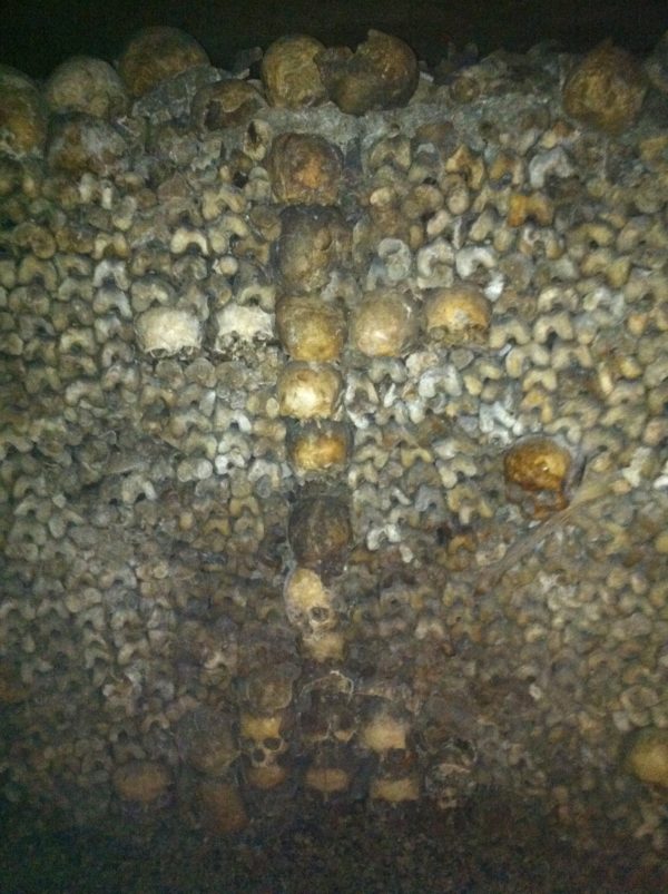 A cross made of skulls in the Catacombs in Paris. Photo credit: L. Tripoli
