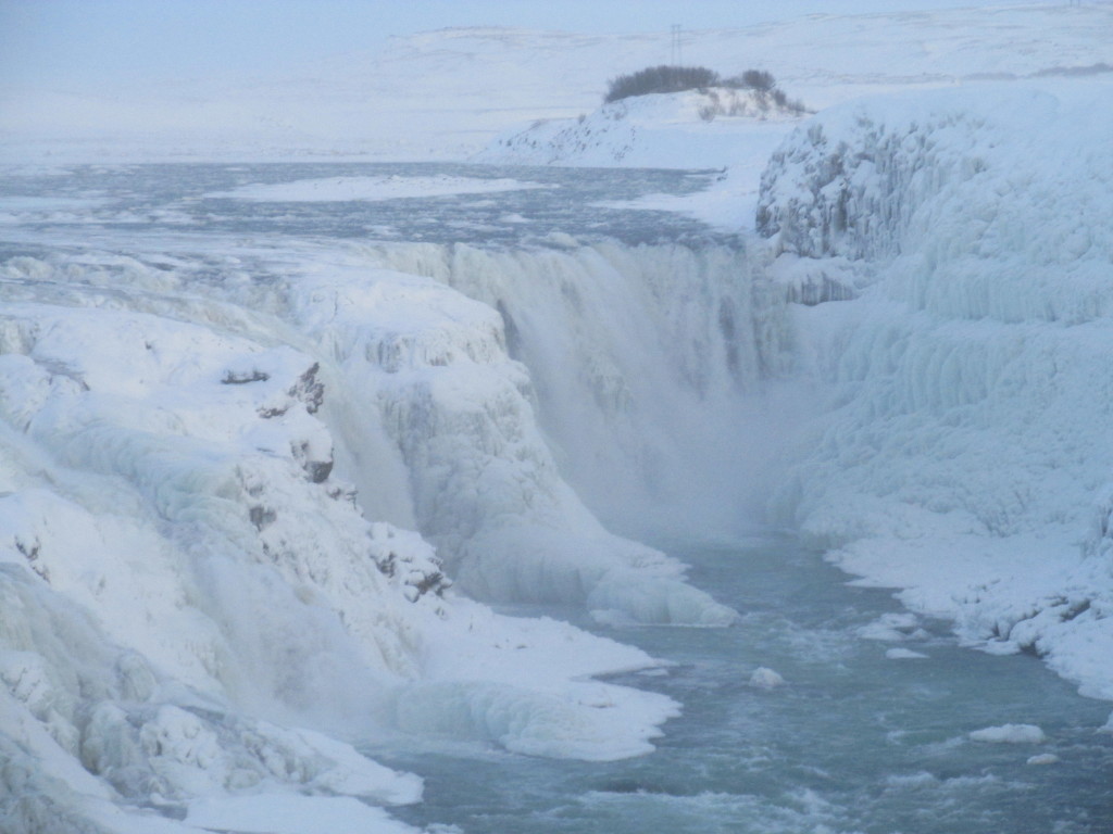 Gullfoss waterfall in Iceland is cold and largely frozen in winter. Photo credit: M. Ciavardini.i