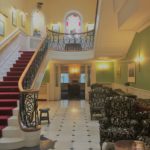 A grand sweeping staircase pretty much guarantees a traveler will enjoy her stay. Here, the lobby of the Dromhall Hotel in Killarney, County Kerry, Ireland. Photo credit: M. Ciavardini