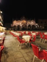 Dining tables and chairs in Piazza San Marco, Venice. Photo credit: M. Ciavardini.