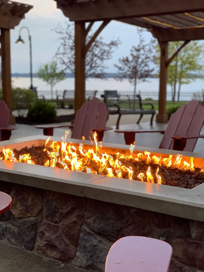 A firepit at the 1000 Islands Harbor Hotel keeps guests warm as they take in the view of the St. Lawrence Seaway. Photo credit: L. Tripoli.