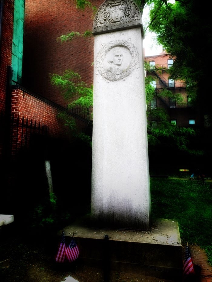 A memorial in the Granary Buryign Ground in Boston, MA to John Hancock, who signed the Declaration of Independence prominently.  Photo credit: L. Tripoli.